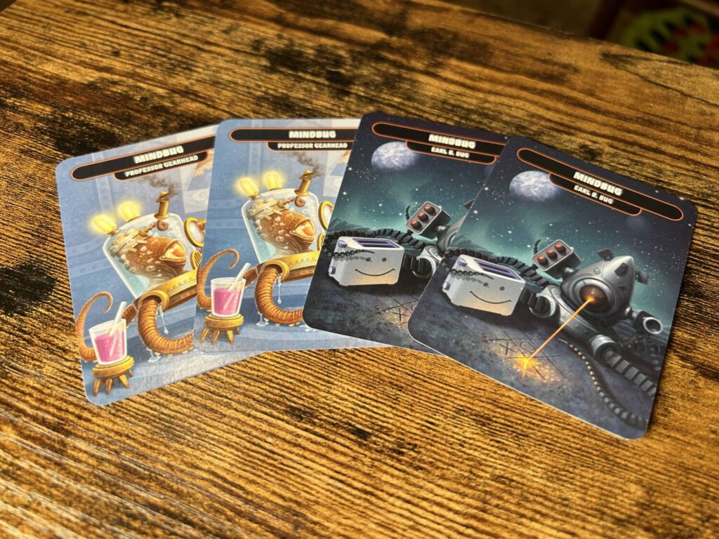 Two of the Mindbug cards.