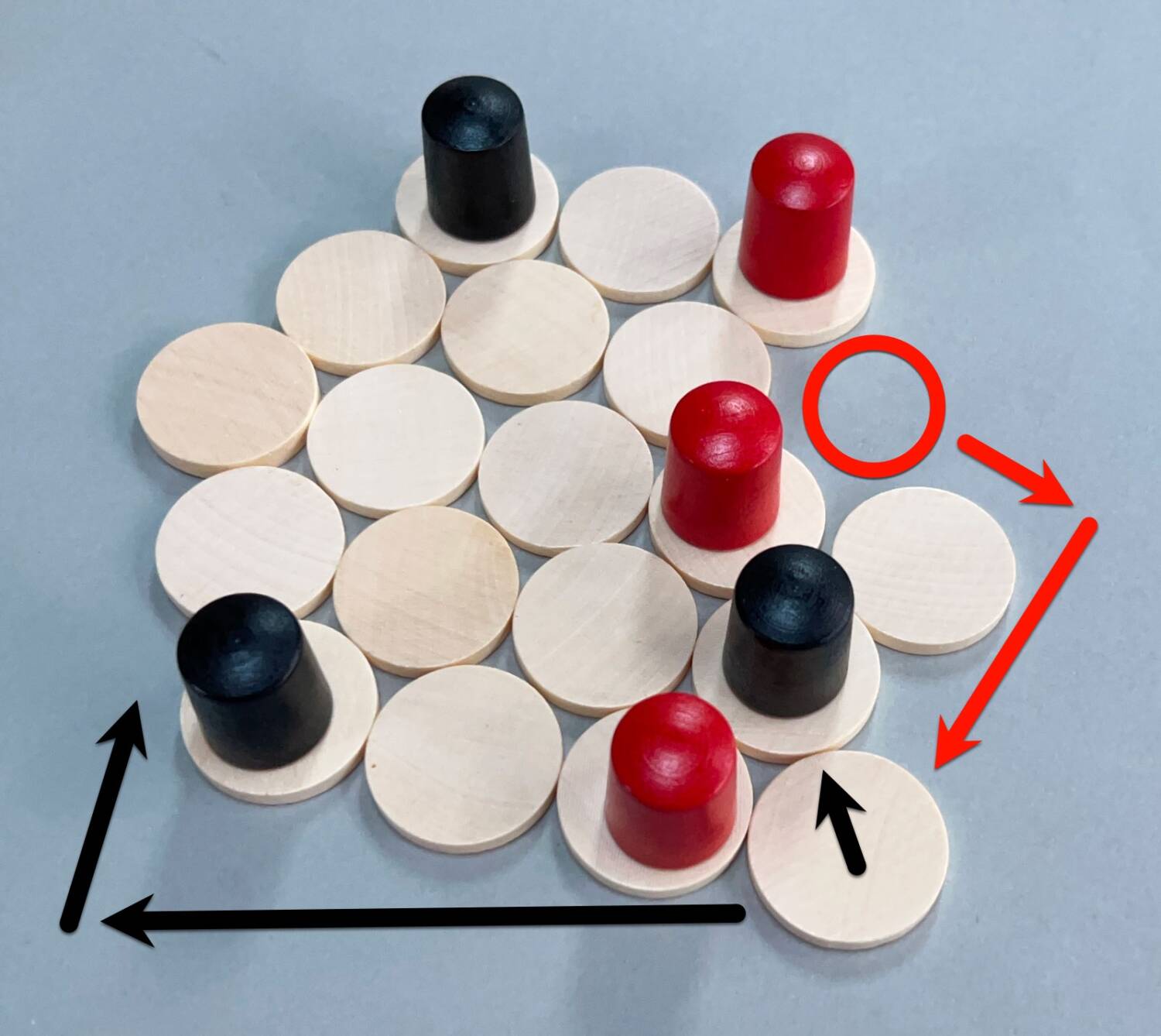 After red's move (see above) they move a disk to a new position, as indicated by the red arrows. Black then moves down one disc and moves the same disc to a new location, as shown by the black arrows.