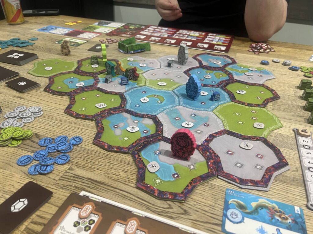 The board for Whisperwood, a large collection of interlocking tiles with various terrains.