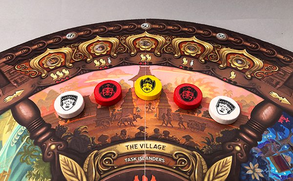 Three players bidding on The Village region of the board.
