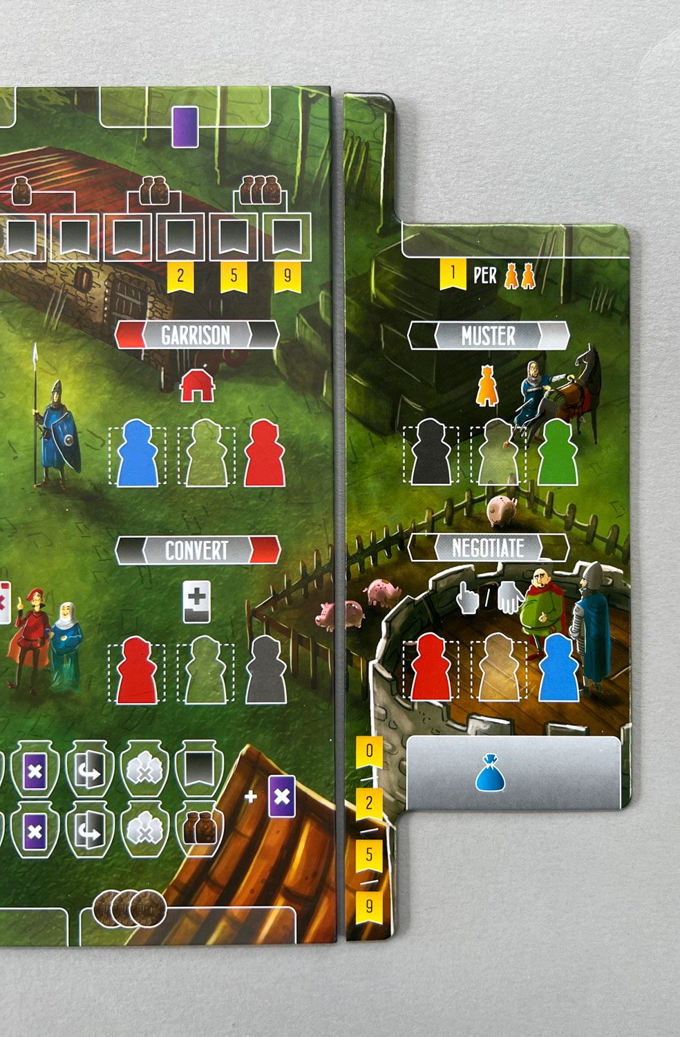 The new extension to the right side of the player board. I appreciate how the artwork continues into the new area.