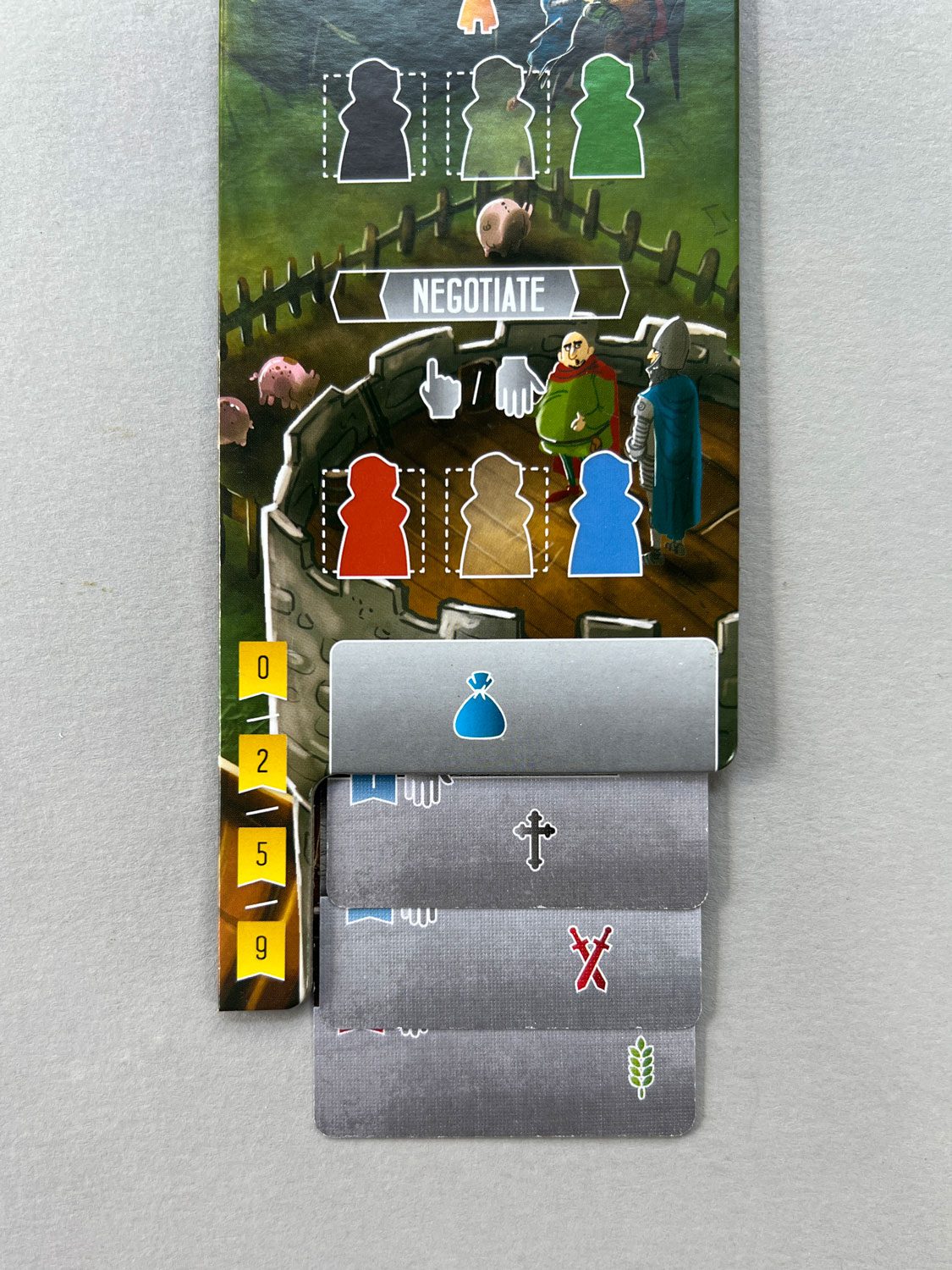 Three Negotiate cards, each with different icons and the pre-printed icon on the board extension. This is worth 9 points during end-game scoring.