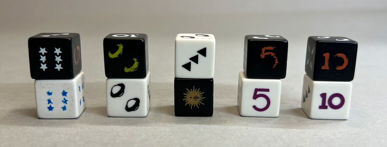 My original black dice set, along with the white replacement set when the black set became too difficult to read late at night