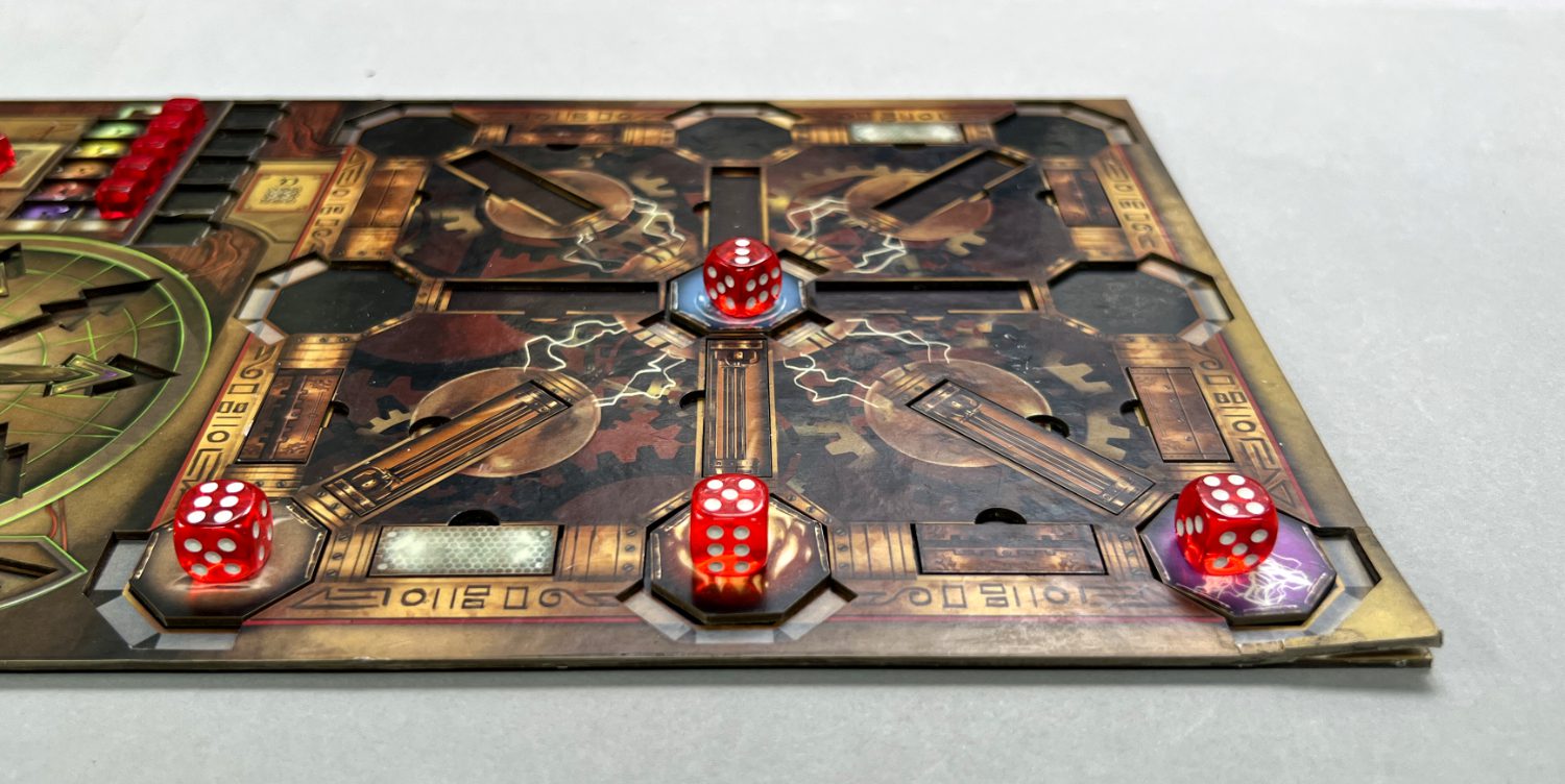 Here, the central die has been turned sideways. The front center cannon can now add 4 from the cannon die to the left and 3 from the cannon die to the right for 13. The left cannon (5) can get and additional 4 from the center cannon die (not shown) and 5 from the angled central die, for a total of 14. The right cannon (5) would get 3 from the center cannon die (not shown) and 6 from the angled central die.