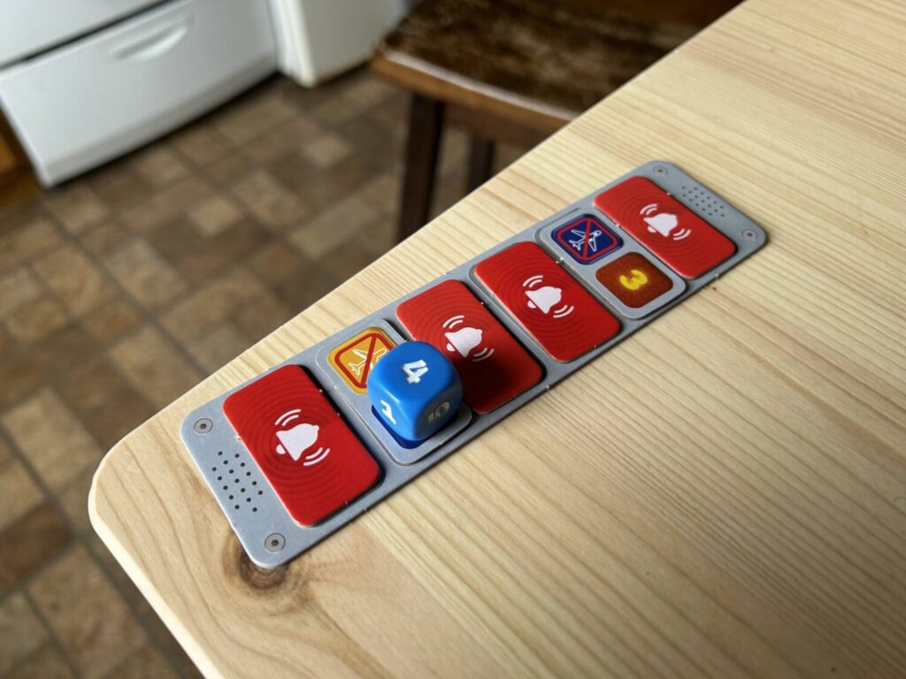 The Alarms module is represented by a column of six tokens, each with a different system failure on the opposite side.