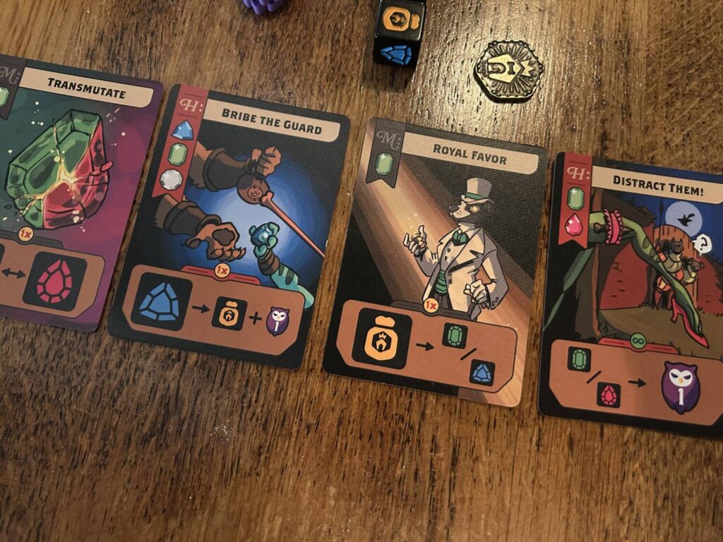 A closer photo of several cards, each with a conversion power at the bottom of the card.