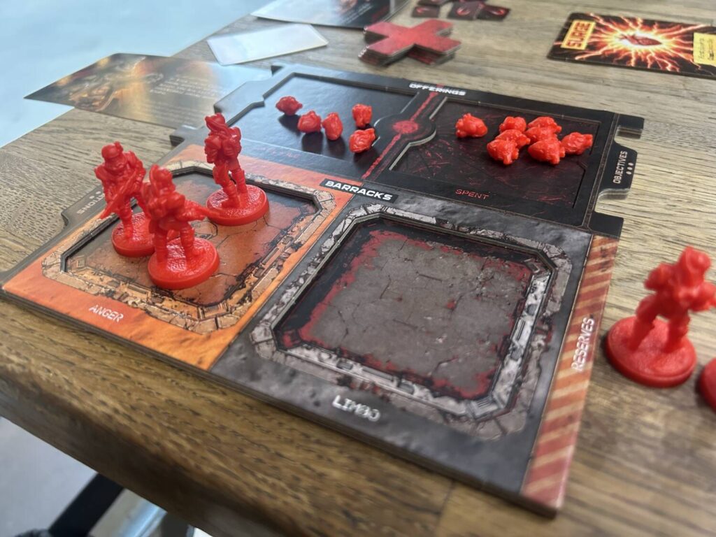 A player board, divided into four sections. The top two are for hearts, the bottom two are for Warriors.