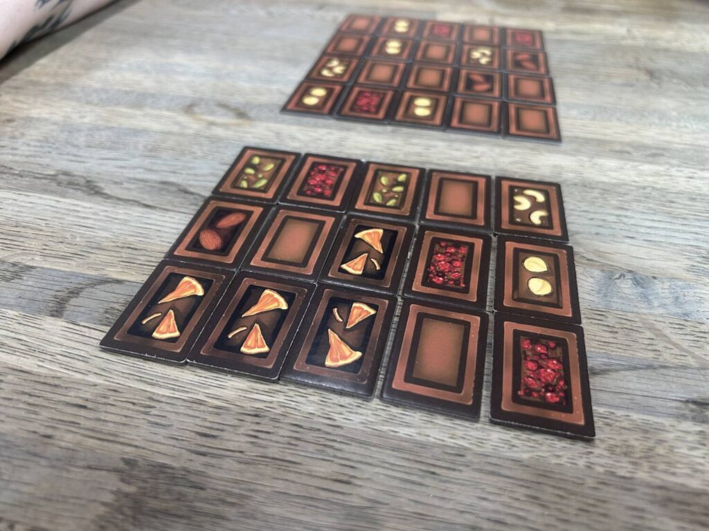 A 5 x 7 grid of chocolate rectangles, split in half as the game begins.