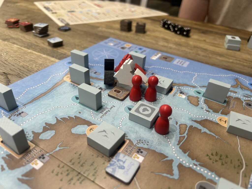 A ship token sits, revealed, and surrounded by other player tokens.